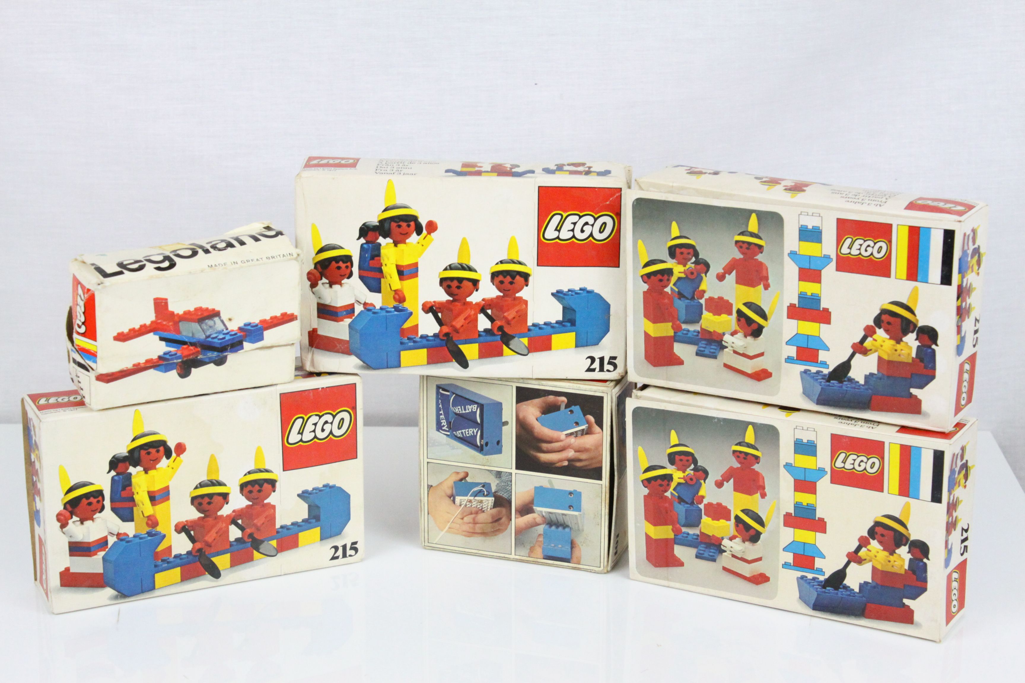 Six boxed Lego sets to include 4 x 215 Red Indians, 609 Aeroplane, and 101 Battery, appearing