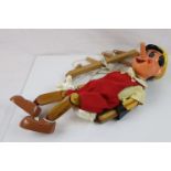 Wooden hand painted Pinnochio puppet