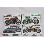 Four boxed Tamiya plastic model kits to include 1/12 1409 Suzuki RGB500 Team Gallina, 1/24 2451
