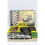 Boxed Triang Scalextric Set 31 with both slot cars, unchecked but appearing gd, tatty box