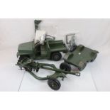 Two original Palitoy Action Man vehicles to include Army Landrover and 105mm Light Gun, with