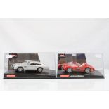 Two cased Carrera Evolution slot cars to include Christmas Edition Mercedes Benz 300 SLR and 25735