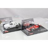 Two cased Carrera Evolution slot cars to include 25707 Ferrari F2002 V10 No 2 and 27345 Mercedes SLS