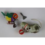 Two mid 20th C tin plate toys, both German, to include Kohler Cat with ball and Western German