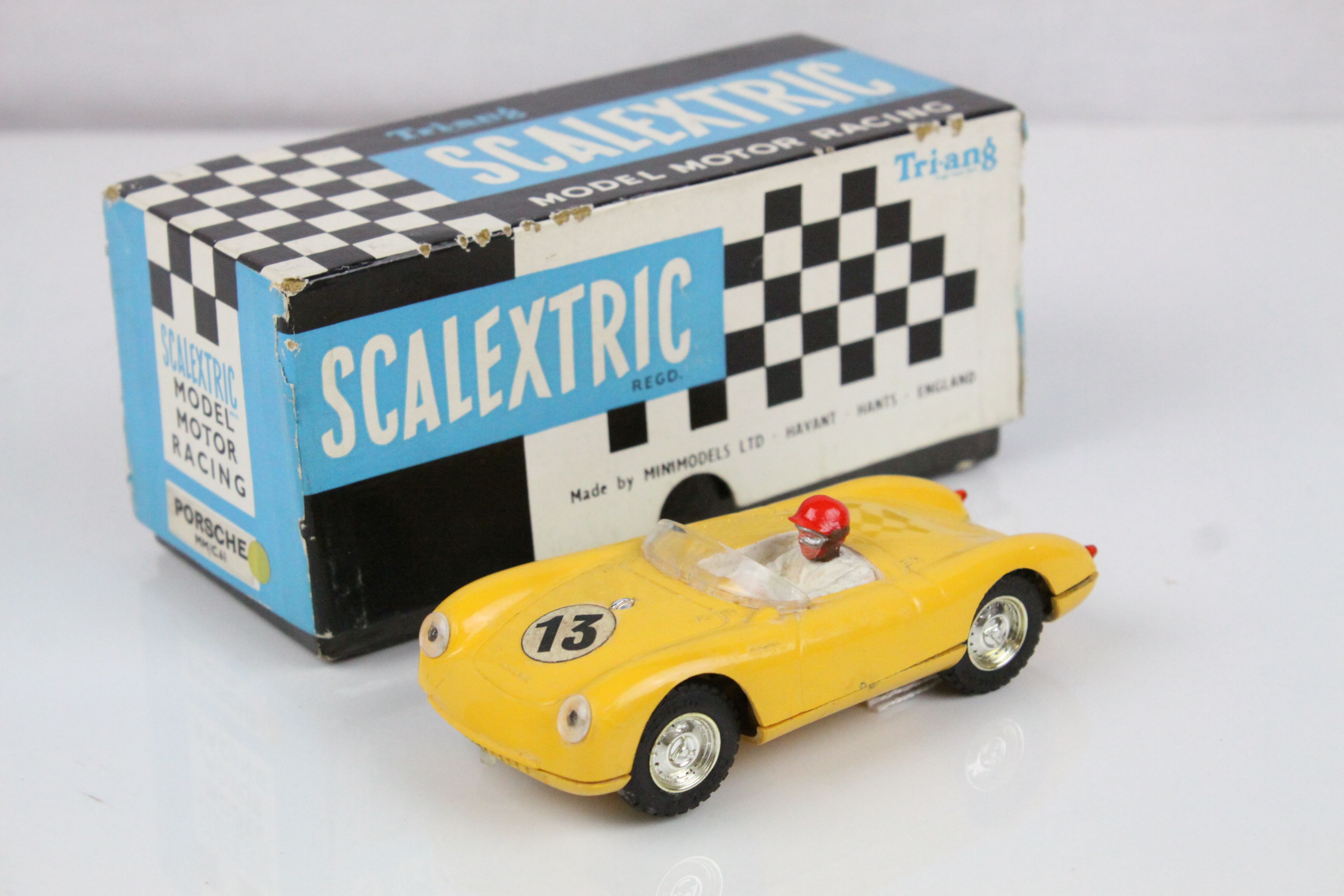 Boxed Triang Scalextric MM C61 Porsche slot car in yellow, driver with red helmet, race number 13,