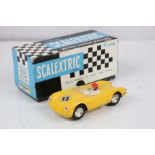 Boxed Triang Scalextric MM C61 Porsche slot car in yellow, driver with red helmet, race number 13,