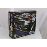 Boxed Sega Mega Drive console with both controllers, box a little tatty, with inner packaging