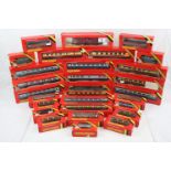 29 Boxed Hornby OO gauge items of rolling stock, featuring Silver Seal, include coaches, vans and