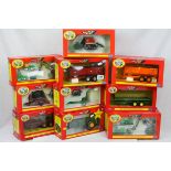 11 Boxed Britains 1:32 Authentic Farm Models to include 42015 Twin Axle Flat Bed Trailer (green),