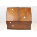 Large 19th century Mahogany Stationery Cabinet with Twin Flaps opening to reveal a Stationery Rack