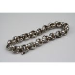 White metal chain link bracelet (tested as silver)