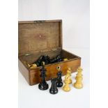 An antique weighted Jaques Style wooden chess set in oak box.