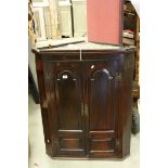 *Antique Walnut Corner Cupboard, moulded cornice above a pair of cupboard doors, the interior