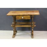 Antique pine trestle table with single drawer below