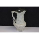 19th century Moulded Relief Water Jug with Pewter Lid, 29cms high
