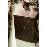 1960's Singer sewing machines with cast metal frame and foot pedal housed in wooden cabinet with