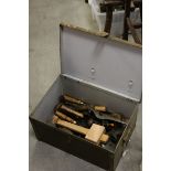 Vintage metal box containing wood working tools