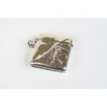 Silver vesta case with embossed image of a golfer