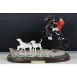 Beswick Hunt figurine with rearing huntsman and three hunt hounds titled "Tally Ho" to base marked