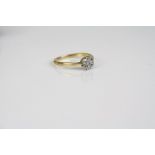 An 18ct yellow gold diamond ring.