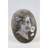 Art Deco Oval Silvered Metal Plaque with a Relief Portrait of a Girl, signed Lorenzl 1925, 25cms