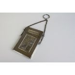 A vintage white metal oriental card case.