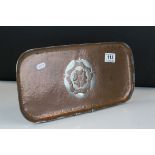 Arts and Crafts Copper Tray with a stylised white metal floral motif. stamped PG, 38cms x 18cms
