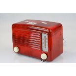 Early 20th century U.S.A Red Enamelled Radio with Cream Bakelite Tuning Knobs, 15cms high