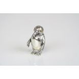 Silver figure of a penguin