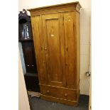 Victorian pine wardrobe with bottom drawer