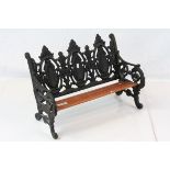 Cast metal and wooden slated miniature garden bench/dolls seat in the Colebrookdale style