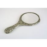 Antique E.P.N.S decorative hand mirror with green man decoration together with a Brass ' Mr