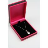 14CT white gold diamond set pendant necklace on gold chain