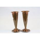 Pair of Early 20th century Arts and Crafts Weighted Copper Vases, 15cms high.