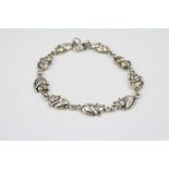 Unusual silver bracelet in the form of cats