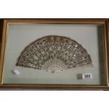 19th century Continental Fan, the ivory sticks with steel pin inlay, the gauze panels with