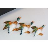 Set of three Beswick flying duck wall hanging figures back stamped numbers 5962, 5963 and 5964