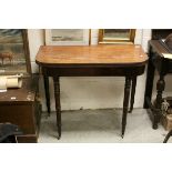 Early 19th century Mahogany Fold-over Card Table, the top opening to reveal a red baize playing