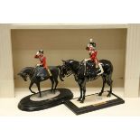 Two figurines of Queen Elizabeth II on horseback to include Coalport example titled "Trooping the