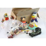 Group of toys to include two vintage style tinplate clockwork cars, tinplate Laxmi car etc
