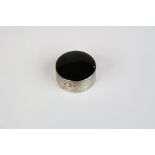 Silver pill box with onyx lid