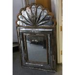 19th century Gilded Pine Mirror, the crest in fan form, 134cms high x 79cms wide (some mirrored