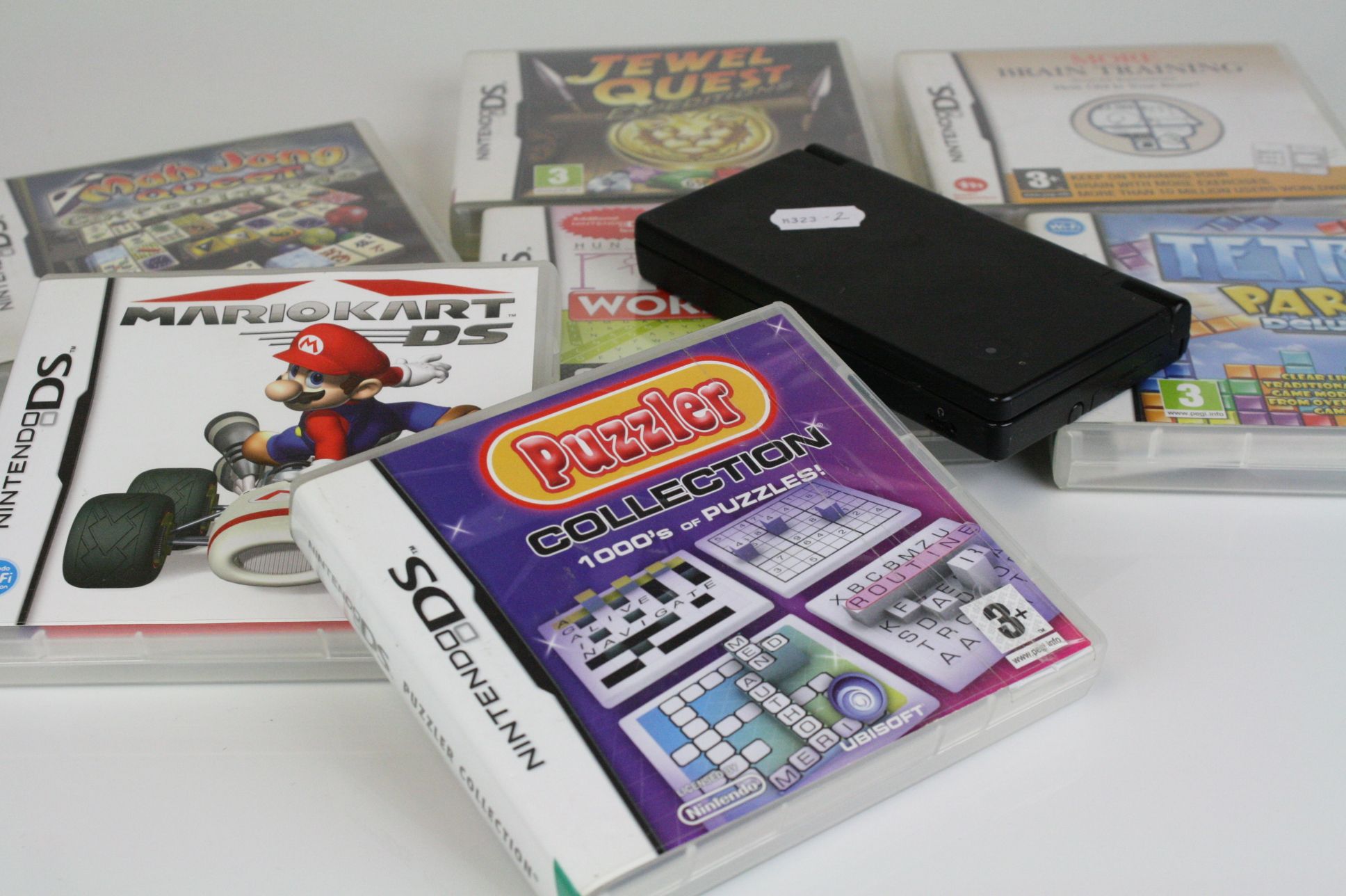 A Nintendo DS handheld games console together with a selection of games. - Image 6 of 6