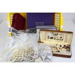 A box of mixed costume jewellery to include a quantity of watches.