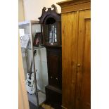 19th century Oak and Mahogany Longcase Clock with broken swan neck pediment, the arched painted face