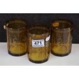 Three 19th century Bohemian Etched Amber Glass Faceted Beakers, 10.5cms high