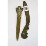 Early 20th Century brass paper knife with rat decorated handle and a similar with a Harlequin handle