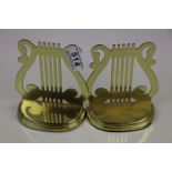 Pair of brass harp design bookends