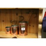 Set of Three Copper Graduating Measures with Brass Hanging Handles and Brass Plaques ' 2 Pint ', '