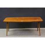 Mid 20th century Retro Teak Coffee Table raised on turned tapering legs, 107cms long x 45cms high